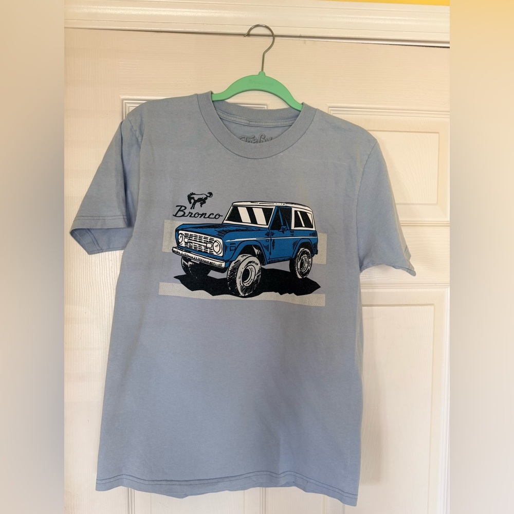 Tee Luv Ford Bronco graphic tee in light blue. Size men’s small.